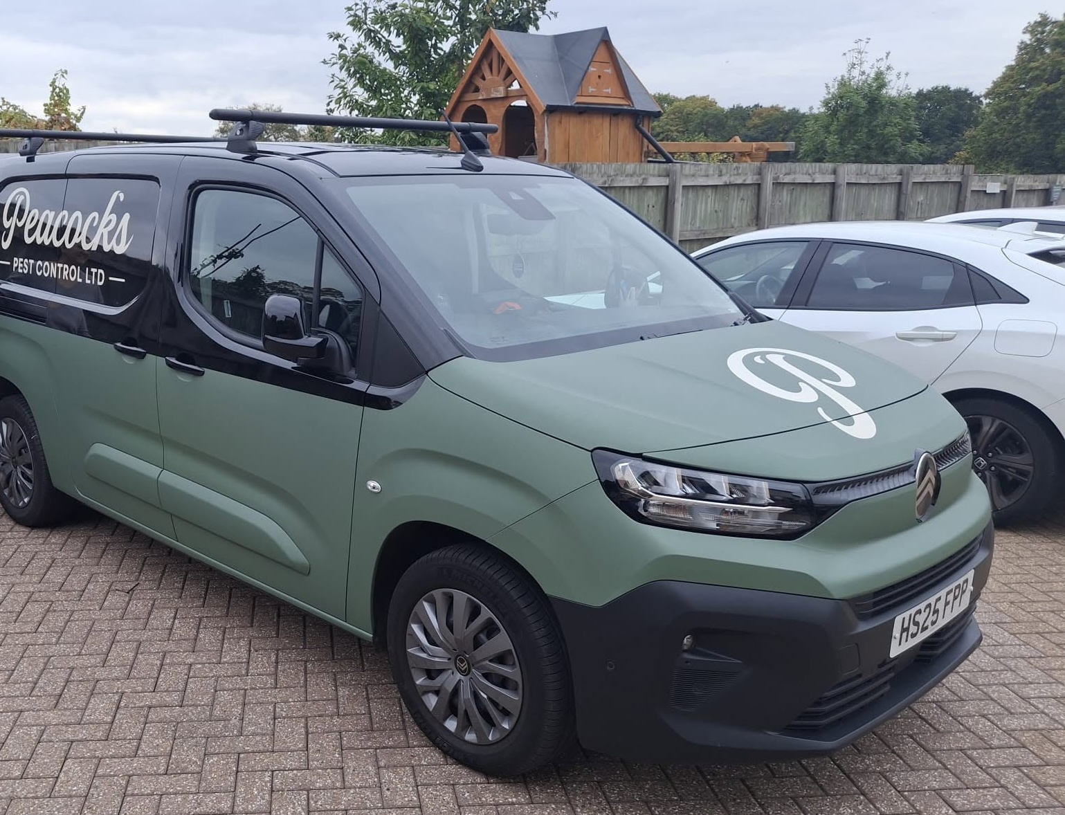 Peacocks branded van